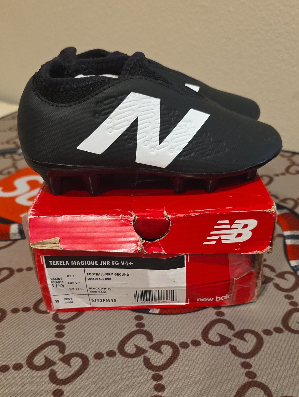 New Balance Kids Black and White Soccer Cleats